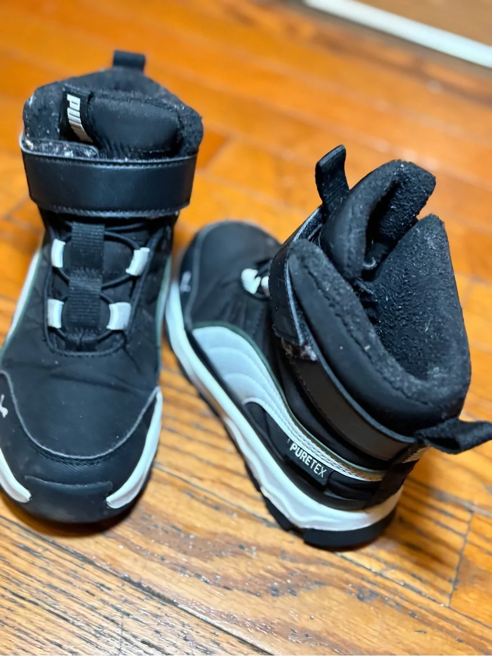 Puma Black Kids Boots with Light Gray Trim
